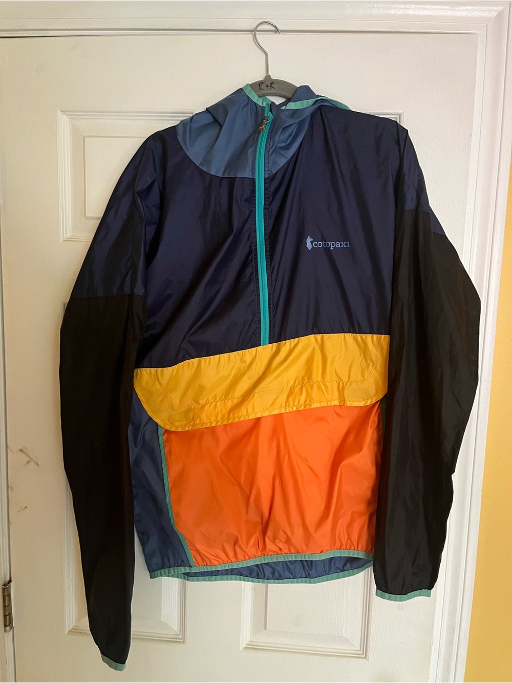 cotopaxi Men’s Colorblock Windbreaker Jacket in Navy, Orange & Yellow